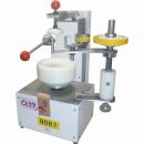 蓋のテープ止め機