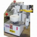 蓋のテープ止め機